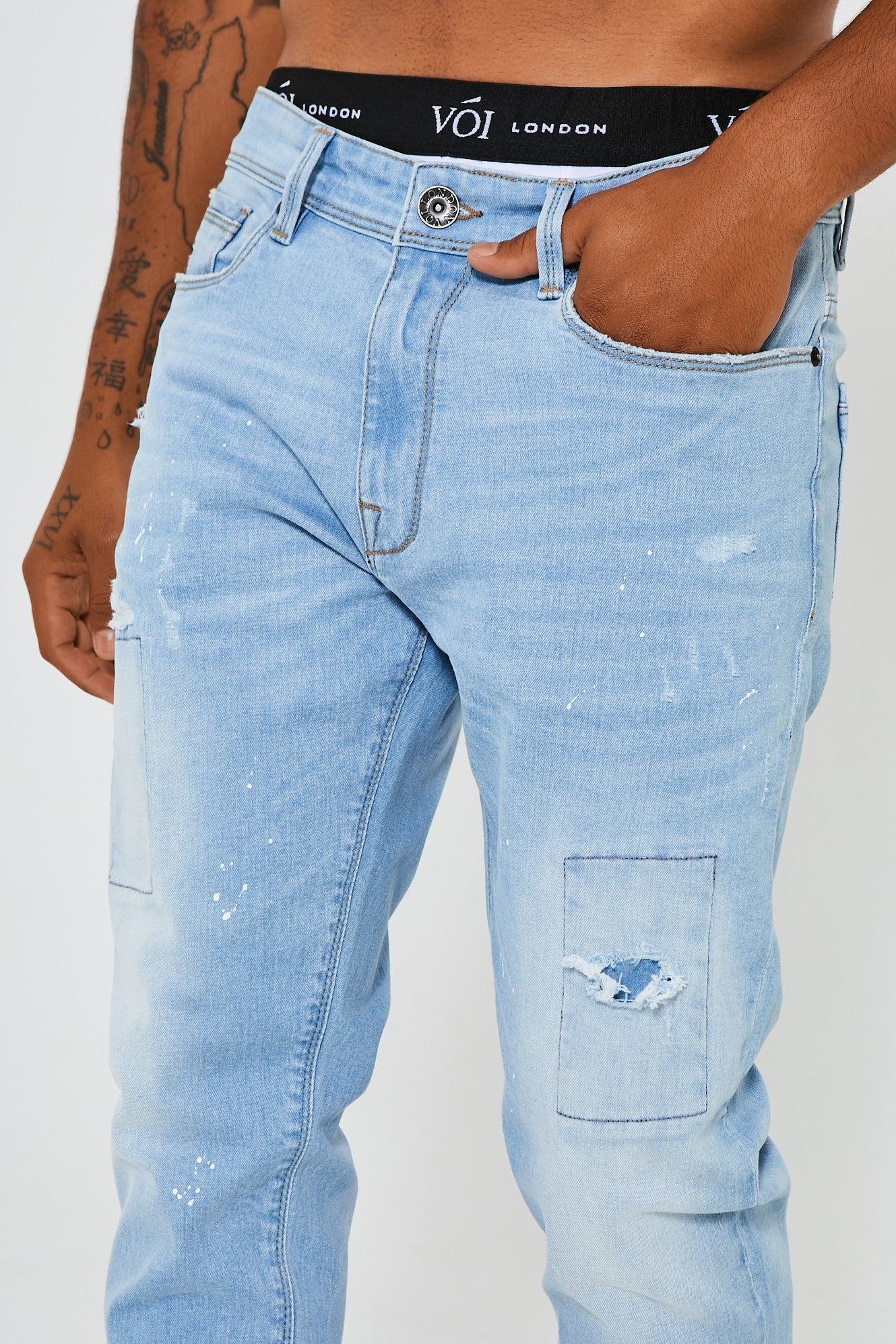 Mens distressed tapered outlet jeans