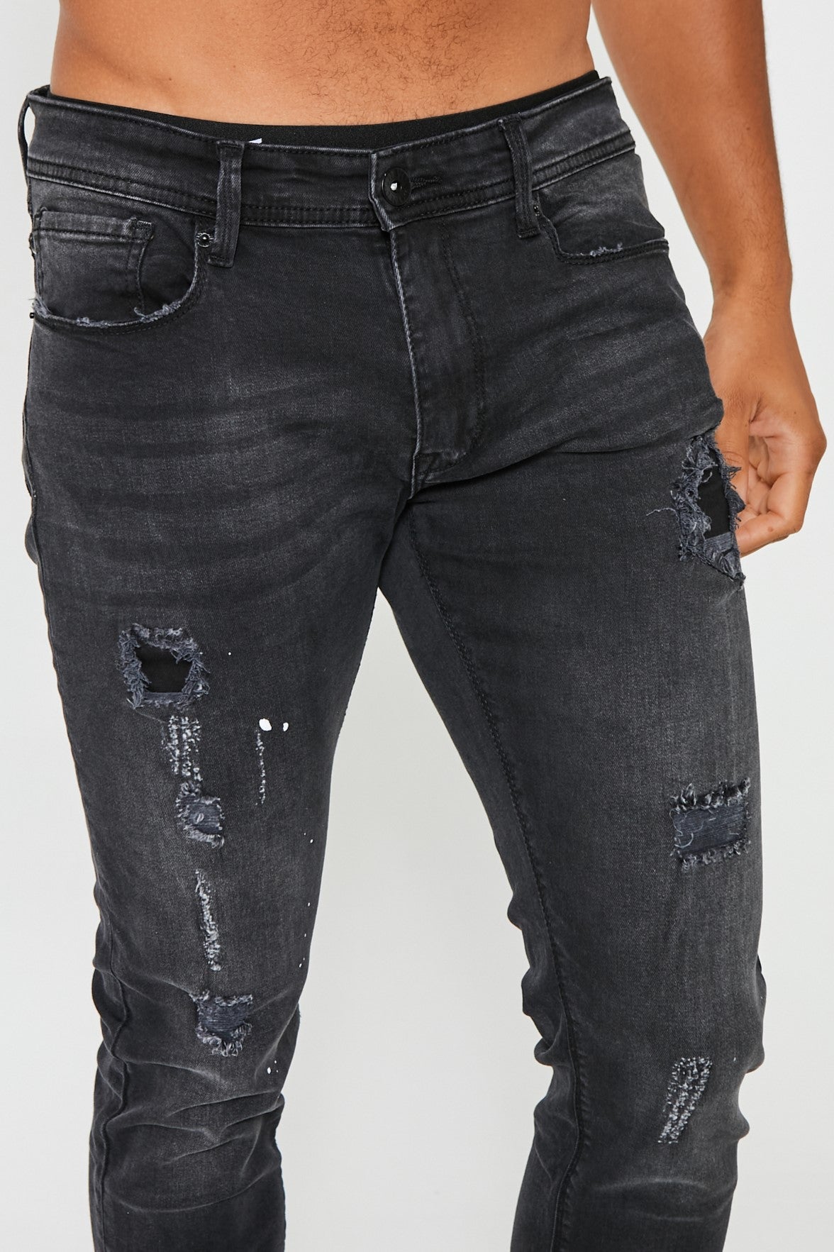 Mens black 2024 ripped tapered jeans