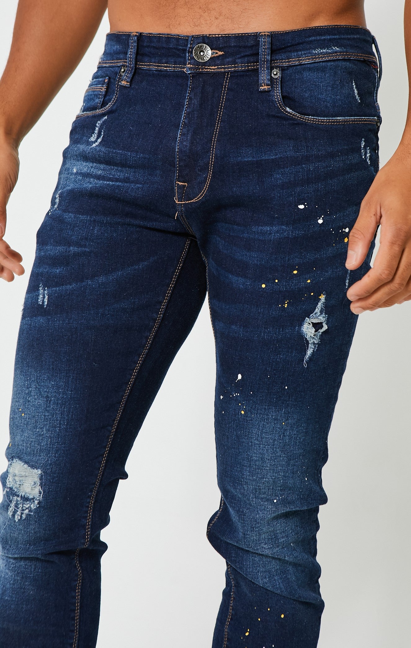 Blue jeans store with paint splatter