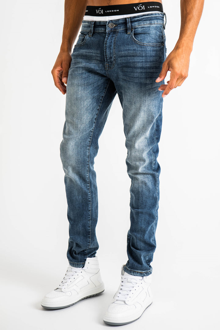 Hamilton taps toelopende jeans - middenblauw